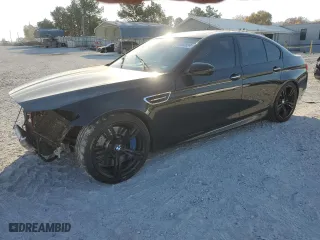 2015 BMW M5 with VIN WBSFV9C52FD594673, listed as a Copart auction lot 77460894 with 131,755 mi miles and Clean Title. Bid and sale history available at carsss.com. Image 1.