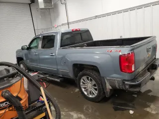 2016 Chevrolet Silverado 1500 High Country with VIN 3GCUKTEC5GG165399, listed as a Copart auction lot 50816695 with 134,213 mi miles and Salvage Title. Bid and sale history available at DreamBid. Image 2.