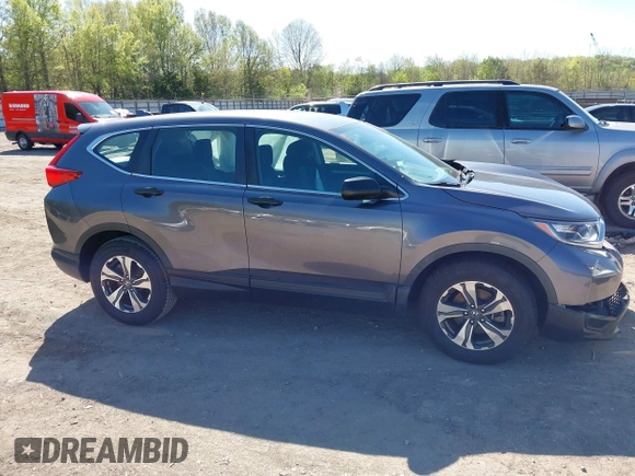 2019 Honda CR-V LX with VIN 2HKRW5H32KH410676, listed as a IAAI auction lot 42038654 with 94,342 mi miles. Bid and sale history available at carsss.com. Image 13.