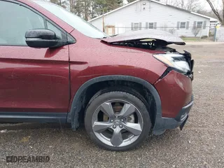 2019 Honda Passport Touring with VIN 5FNYF8H99KB005625, listed as a IAAI auction lot 41905030 with 64,998 mi miles. Bid and sale history available at carsss.com. Image 19.