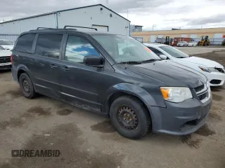 2012 Dodge Grand Caravan SE with VIN 2C4RDGBG5CR397651, listed as a Copart auction lot 52878905 with 248,103 mi miles and Clean Title. Bid and sale history available at DreamBid. Image 4.