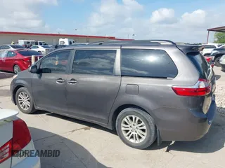 2015 Toyota Sienna XLE with VIN 5TDYK3DC6FS542504, listed as a IAAI auction lot 42569992 with 113,004 mi miles and . Bid and sale history available at DreamBid. Image 14.