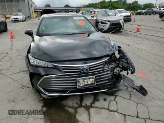 2021 Toyota Avalon Hybrid XLE z VIN 4T1AA1AB5MU002781, wystawiony jako Copart lot #56916685 z przebiegiem 26 132 mil mil oraz Szkoda całkowita • Salvage title. Historia ofert i sprzedaży dostępna na DreamBid. Obrazek 13.