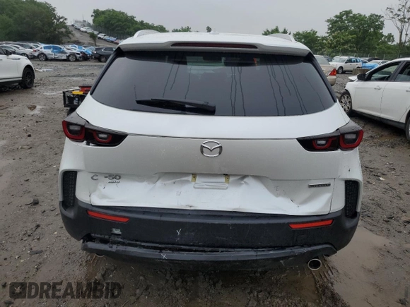 2025 Mazda CX-50 S Premium z VIN 7MMVABDM9SN331032, wystawiony jako Copart lot #60797015 z przebiegiem 9 572 mil mil oraz Nie do naprawy • Non repairable. Historia ofert i sprzedaży dostępna na DreamBid. Obrazek 6.