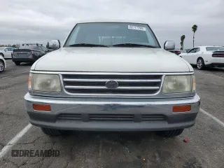 1995 Toyota T100 SR5 with VIN JT4VD12F8S0007489, listed as a Copart auction lot 82177794 with 290,145 mi miles and Clean Title. Bid and sale history available at DreamBid. Image 5.