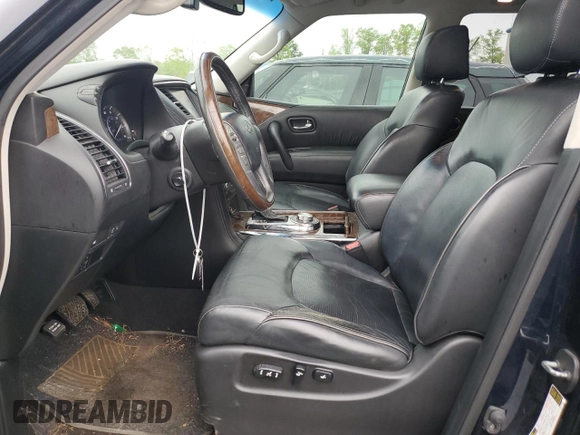 2015 Infiniti QX80 с VIN JN8AZ2NEXF9081513, выставлен на аукционе Copart как лот 51276015 с пробегом 158 004 миль миль и Списание • Salvage title. История ставок и продаж доступна на DreamBid. Изображение 7.