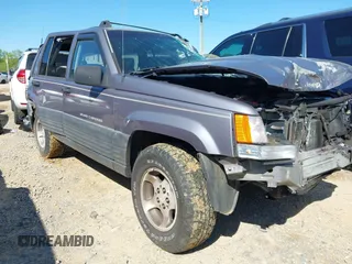 1996 Jeep Grand Cherokee Laredo with VIN 1J4GZ58S1TC168797, listed as a IAAI auction lot 41983746 with 1 mi miles. Bid and sale history available at carsss.com. Image 1.