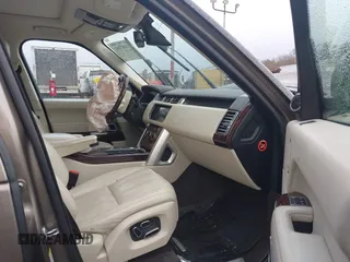 2015 Land Rover Range Rover HSE z VIN SALGS2VF4FA220237, wystawiony jako IAAI lot #41087301 z przebiegiem 110 309 mil mil oraz . Historia ofert i sprzedaży dostępna na DreamBid. Obrazek 5.