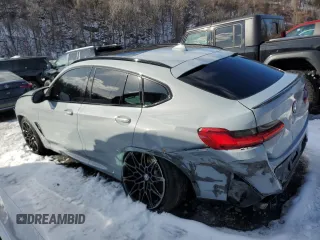 2024 BMW X4 M z VIN 5YM23EC01R9W18369, wystawiony jako Copart lot #53838455 z przebiegiem 11 550 mil mil oraz Szkody całkowita. Historia ofert i sprzedaży dostępna na DreamBid. Obrazek 2.