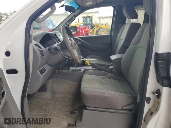 2014 Nissan Frontier S with VIN 1N6BD0CTXEN747129, listed as a Copart auction lot 60246865 with 117,612 mi miles and Salvage title. Bid and sale history available at DreamBid. Image 7.