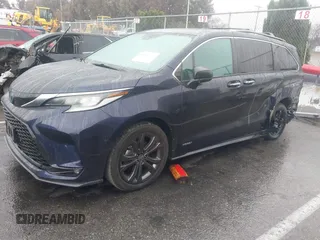 2021 Toyota Sienna XSE with VIN 5TDXRKEC5MS020539, listed as a IAAI auction lot 41569311 with 86,902 mi miles and . Bid and sale history available at DreamBid. Image 2.