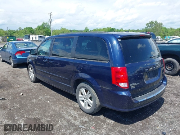 2012 Dodge Grand Caravan SXT with VIN 2C4RDGCGXCR277505, listed as a IAAI auction lot 42194492 with 206,565 mi miles and . Bid and sale history available at DreamBid. Image 3.