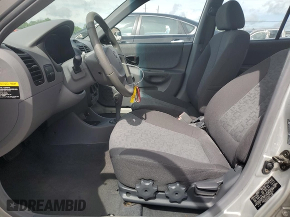 2004 Hyundai Accent GL with VIN KMHCG45C64U524377, listed as a Copart auction lot 53976094 with 65,230 mi miles and Non Repairable. Bid and sale history available at carsss.com. Image 7.