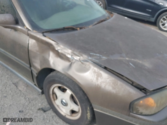 2003 Chevrolet Impala with VIN 2G1WF52E339357819, listed as a IAAI auction lot 41918563 with 1 mi miles. Bid and sale history available at carsss.com. Image 6.