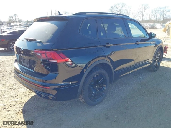 2022 Volkswagen Tiguan SE R-Line Black with VIN 3VVCB7AX1NM084993, listed as a IAAI auction lot 41502738 with 56,559 mi miles. Bid and sale history available at carsss.com. Image 4.