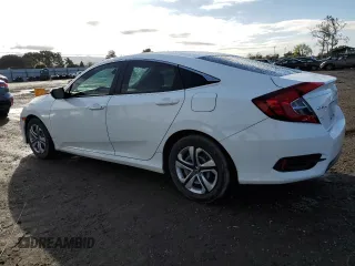 2016 Honda Civic Sedan LX with VIN 19XFC2F58GE035323, listed as a Copart auction lot 51520235 with 141,304 mi miles and Salvage Title. Bid and sale history available at carsss.com. Image 2.