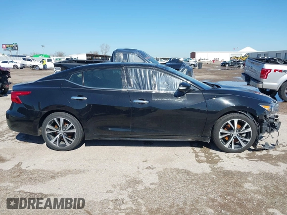 2018 Nissan Maxima SV with VIN 1N4AA6AP3JC387178, listed as a IAAI auction lot 41753170 with 112,538 mi miles and . Bid and sale history available at carsss.com. Image 14.