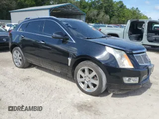 2011 Cadillac SRX Premium Collection with VIN 3GYFNFEY0BS558904, listed as a Copart auction lot 63299125 with Not provided miles and Clean title. Bid and sale history available at DreamBid. Image 4.