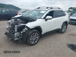 2022 Toyota RAV4 XLE Premium z VIN 2T3A1RFV4NW287421, wystawiony jako IAAI lot #42602371 z przebiegiem 59 294 mil mil oraz . Historia ofert i sprzedaży dostępna na DreamBid. Obrazek 17.