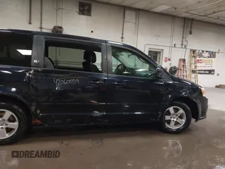 2011 Dodge Grand Caravan Mainstreet z VIN 2D4RN3DG2BR627795, wystawiony jako IAAI lot #42060059 z przebiegiem 91 442 mil mil oraz . Historia ofert i sprzedaży dostępna na DreamBid. Obrazek 6.