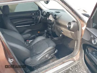 2014 MINI Paceman z VIN WMWSS1C58EWN94368, wystawiony jako IAAI lot #41377194 z przebiegiem 56 897 mil mil oraz . Historia ofert i sprzedaży dostępna na DreamBid. Obrazek 5.