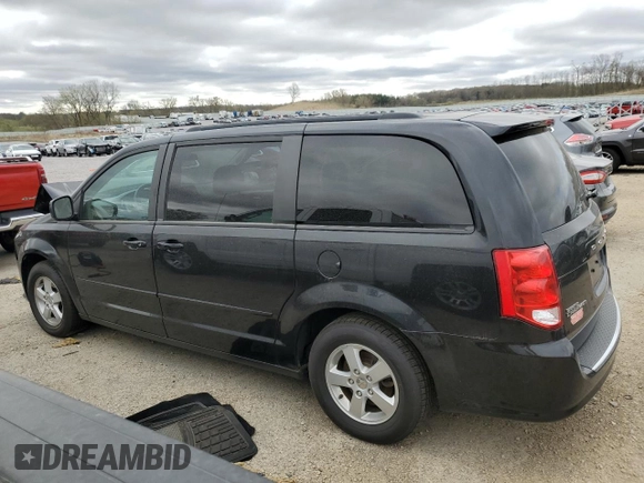 2012 Dodge Grand Caravan SXT with VIN 2C4RDGCG5CR253449, listed as a Copart auction lot 54592975 with 86,200 mi miles and Non Repairable. Bid and sale history available at DreamBid. Image 2.