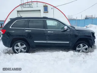 2011 Jeep Grand Cherokee Overland with VIN 1J4RR6GT5BC604784, listed as a IAAI auction lot 41515626 with 66,654 mi miles. Bid and sale history available at carsss.com. Image 14.