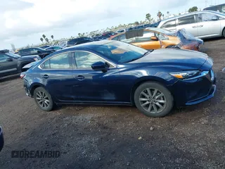 2020 Mazda 6 Sport with VIN JM1GL1UM5L1519519, listed as a IAAI auction lot 41920571 with 59,378 mi miles and . Bid and sale history available at DreamBid. Image 14.