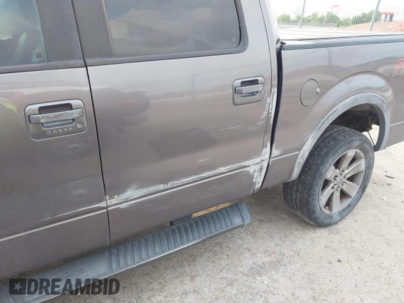 2014 Ford F-150 XL with VIN 1FTFW1EFXEKF21377, listed as a IAAI auction lot 42133053 with 99,924 mi miles and . Bid and sale history available at DreamBid. Image 6.
