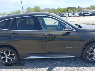 2018 BMW X1 xDrive28i with VIN WBXHT3C39J5F88234, listed as a IAAI auction lot 42044900 with 38,732 mi miles. Bid and sale history available at carsss.com. Image 13.