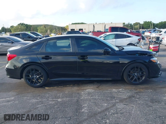 2022 Honda Civic Sport z VIN 2HGFE2F53NH569990, wystawiony jako IAAI lot #41944635 z przebiegiem 20 935 mil mil oraz . Historia ofert i sprzedaży dostępna na DreamBid. Obrazek 14.
