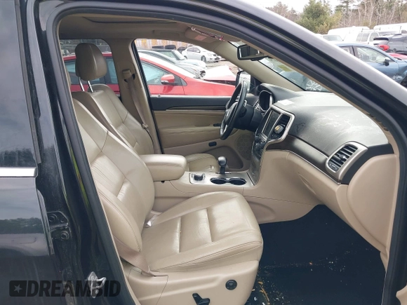 2014 Jeep Grand Cherokee Limited z VIN 1C4RJFBG0EC297746, wystawiony jako IAAI lot #41956879 z przebiegiem 212 106 mil mil oraz . Historia ofert i sprzedaży dostępna na DreamBid. Obrazek 5.