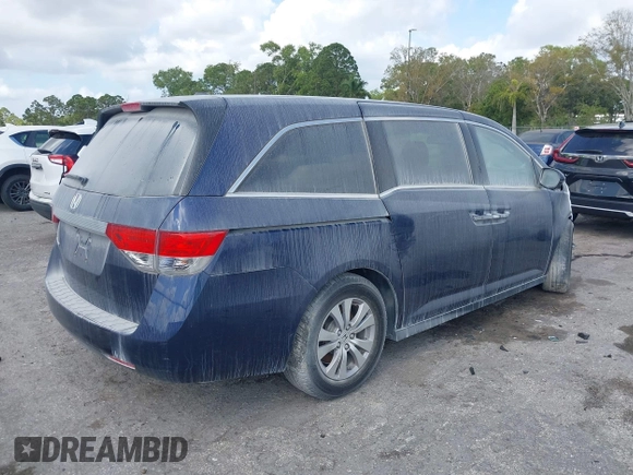 2015 Honda Odyssey EX-L z VIN 5FNRL5H65FB090177, wystawiony jako IAAI lot #41575419 z przebiegiem 128 582 mil mil oraz . Historia ofert i sprzedaży dostępna na DreamBid. Obrazek 4.
