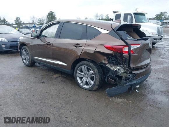 2019 Acura RDX w/Advance Pkg with VIN 5J8TC2H75KL017199, listed as a IAAI auction lot 41565130 with 67,880 mi miles. Bid and sale history available at carsss.com. Image 3.