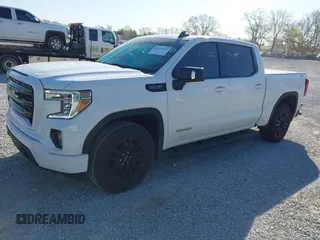 2021 GMC Sierra 1500 Elevation z VIN 3GTU9CED7MG289092, wystawiony jako IAAI lot #42013585 z przebiegiem 64 563 mil mil oraz . Historia ofert i sprzedaży dostępna na DreamBid. Obrazek 2.