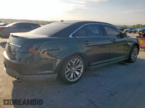 2013 Ford Taurus Limited with VIN 1FAHP2F84DG104520, listed as a Copart auction lot 53167115 with 162,690 mi miles and Clean Title. Bid and sale history available at carsss.com. Image 3.