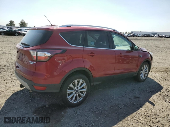 2017 Ford Escape Titanium with VIN 1FMCU9JD6HUB14799, listed as a Copart auction lot 54431685 with 75,454 mi miles and Salvage Title. Bid and sale history available at carsss.com. Image 3.