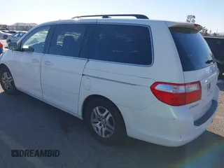 2006 Honda Odyssey EX z VIN 5FNRL38486B410286, wystawiony jako IAAI lot #41641433 z przebiegiem 145 312 mil mil oraz . Historia ofert i sprzedaży dostępna na DreamBid. Obrazek 3.