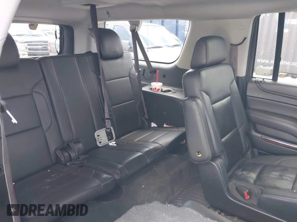 2015 Chevrolet Suburban LT z VIN 1GNSKJKC9FR245097, wystawiony jako IAAI lot #42468168 z przebiegiem 198 454 mil mil oraz . Historia ofert i sprzedaży dostępna na DreamBid. Obrazek 8.
