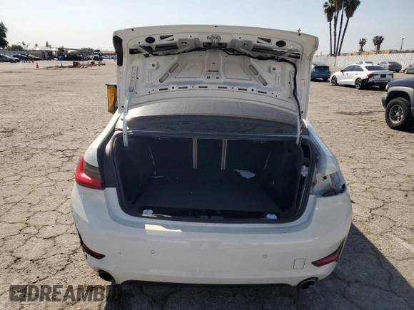 2021 BMW 3 Series 330i with VIN 3MW5R1J0XM8C09626, listed as a Copart auction lot 52205805 with 52,261 mi miles and Salvage title. Bid and sale history available at DreamBid. Image 6.