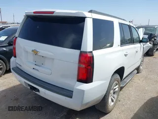 2015 Chevrolet Tahoe LS with VIN 1GNSCAKC3FR687421, listed as a IAAI auction lot 41930895 with Not provided miles and . Bid and sale history available at DreamBid. Image 4.