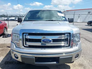 2013 Ford F-150 XL with VIN 1FTEW1CM2DFA62107, listed as a IAAI auction lot 41873021 with 149,648 mi miles and . Bid and sale history available at carsss.com. Image 12.