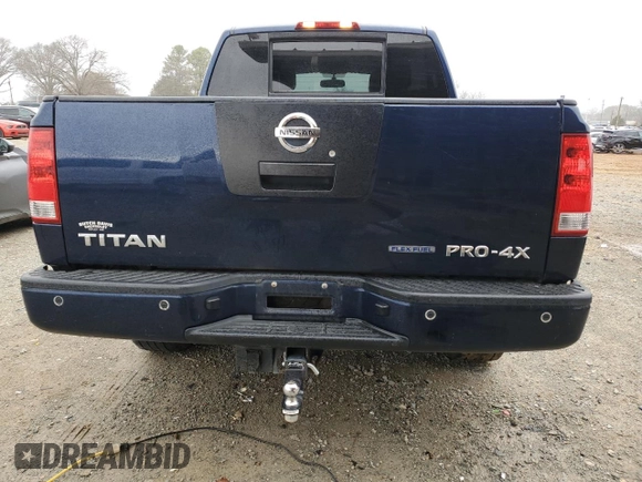 2011 Nissan Titan Pro-4X z VIN 1N6BA0EC0BN322228, wystawiony jako Copart lot #47617305 z przebiegiem 189 151 mil mil oraz Szkoda całkowita • Salvage title. Historia ofert i sprzedaży dostępna na DreamBid. Obrazek 6.
