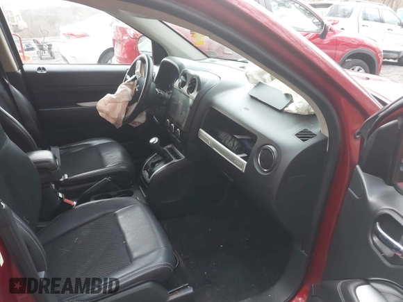 2016 Jeep Compass High Altitude with VIN 1C4NJDEB0GD779584, listed as a IAAI auction lot 41209135 with 143,624 mi miles and . Bid and sale history available at DreamBid. Image 5.