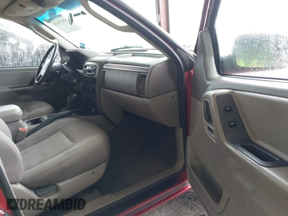 2004 Jeep Grand Cherokee z VIN 1J8GX48SX4C329289, wystawiony jako IAAI lot #41631610 z przebiegiem 212 362 mil mil oraz . Historia ofert i sprzedaży dostępna na DreamBid. Obrazek 5.