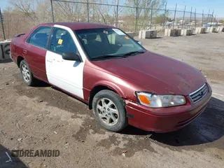 2000 Toyota Camry LE z VIN JT2BF28K1Y0238114, wystawiony jako IAAI lot #41815936 z przebiegiem 410 330 mil mil oraz . Historia ofert i sprzedaży dostępna na DreamBid. Obrazek 1.