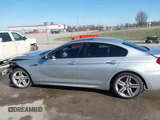2015 BMW 6 Series 640i xDrive with VIN WBA6B8C52FD453433, listed as a IAAI auction lot 41805317 with 138,685 mi miles and . Bid and sale history available at carsss.com. Image 14.