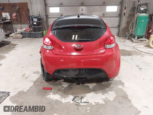 2012 Hyundai Veloster w/Black Int z VIN KMHTC6AD8CU032759, wystawiony jako IAAI lot #41567265 z przebiegiem 156 973 mil mil oraz . Historia ofert i sprzedaży dostępna na DreamBid. Obrazek 16.