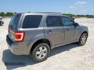 2009 Ford Escape XLS with VIN 1FMCU02739KC12318, listed as a Copart auction lot 61251485 with 179,335 mi miles and Salvage title. Bid and sale history available at DreamBid. Image 3.