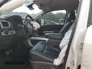 2019 Nissan Titan Pro-4X z VIN 1N6AA1E51KN526104, wystawiony jako Copart lot #51694335 z przebiegiem 56 620 mil mil oraz Szkoda całkowita • Salvage title. Historia ofert i sprzedaży dostępna na DreamBid. Obrazek 7.